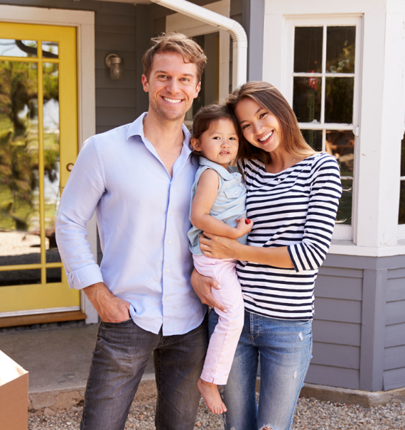 Family in front of a house